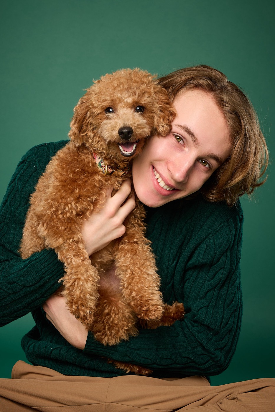 Elijah Zimmerman smiling with his dog Tilly